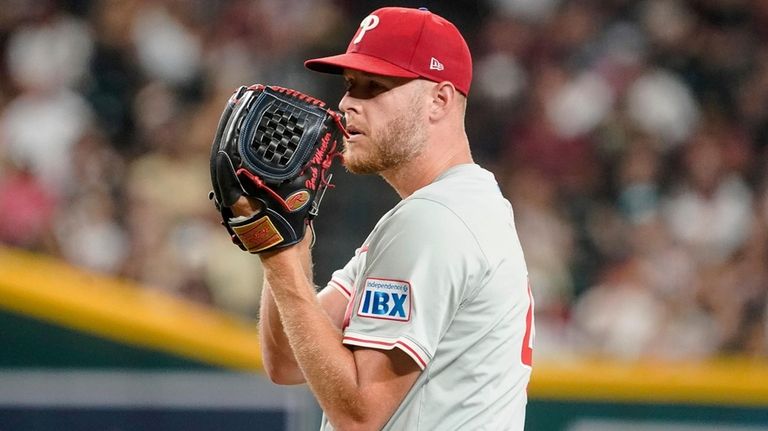 Philadelphia Phillies pitcher Zack Wheeler prepares to throw against the...