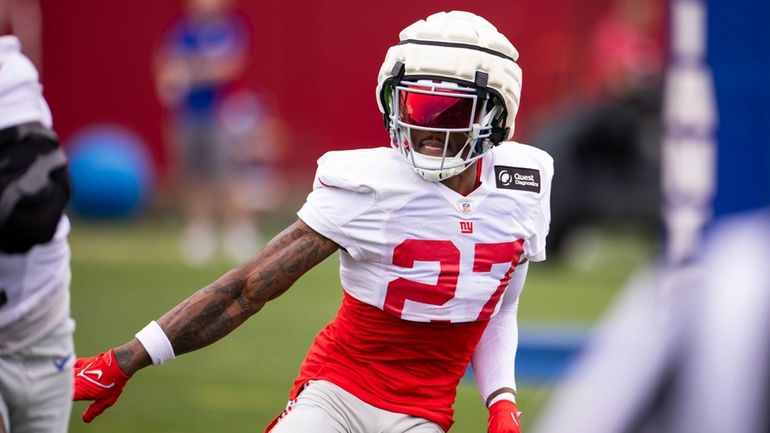 Giants safety Jason Pinnock runs to defend during training camp...