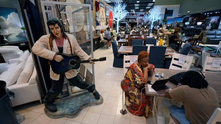 Houston residents Janice Taylor, left, and her daughter Janell spend...