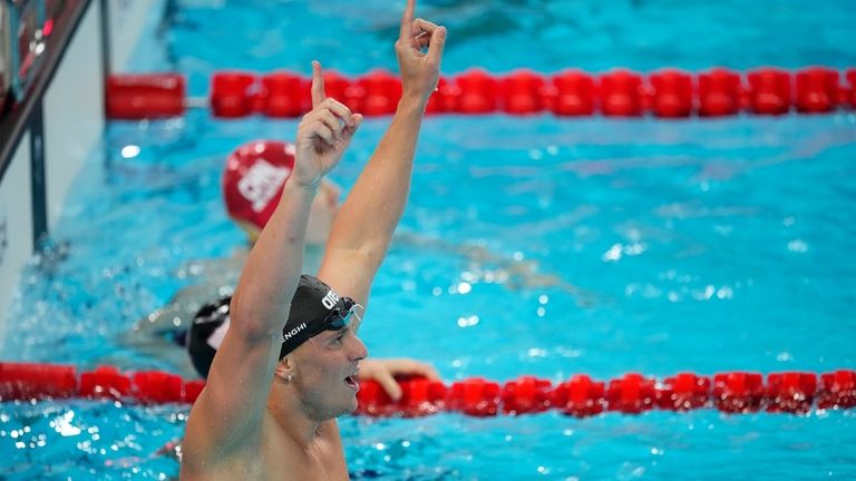 Nicolo Martinenghi, of Italy, celebrates after winning the men's 100-meter...