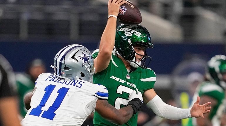 Jets quarterback Zach Wilson is sacked by Dallas Cowboys linebacker...