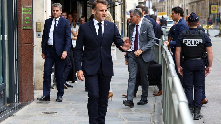 French President Emmanuel Macronarrives to inaugurate of the Maison Elysee,...