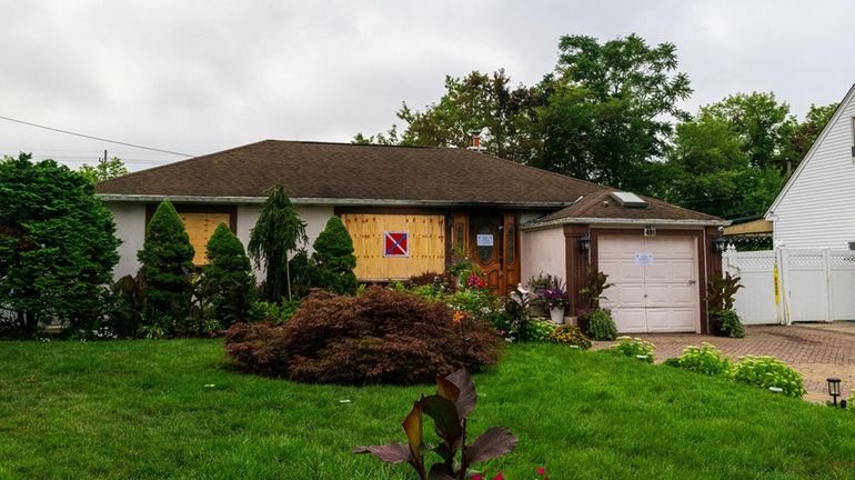 A fire heavily damaged this home on Froelich Place in...