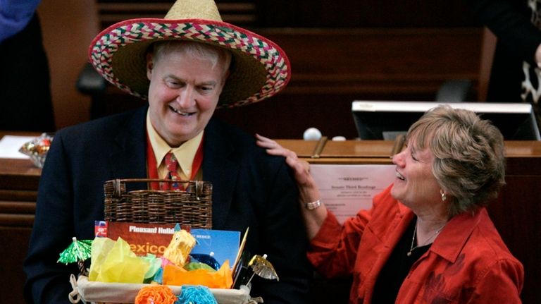 Oregon Senate President Peter Courtney is joined by his wife,...