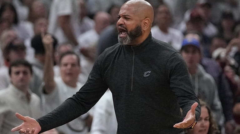 Cleveland Cavaliers coach J.B. Bickerstaff gestures to an official during...