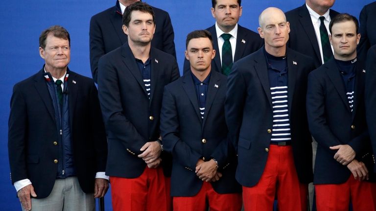 U.S. team captain Tom Watson, left, stands with his team...