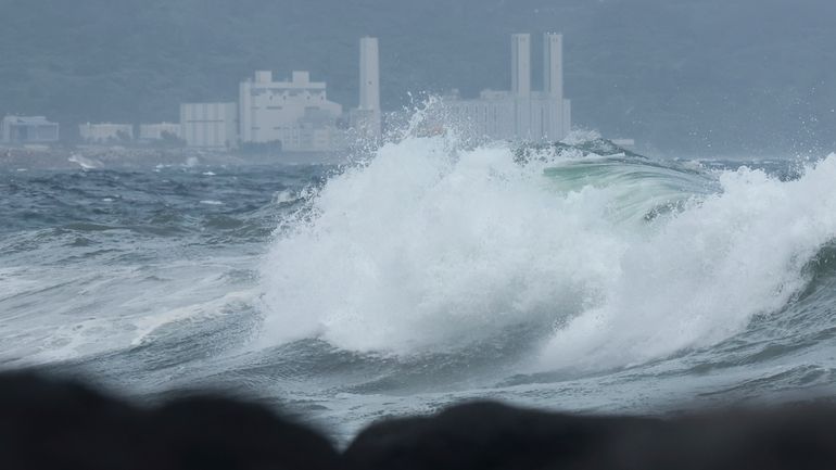 High waves crash ashore as Typhoon Jongdari approaches Jeju Island,...