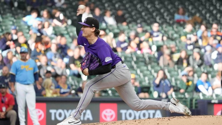 Colorado Rockies pitcher Ryan Feltner throws during the first inning...