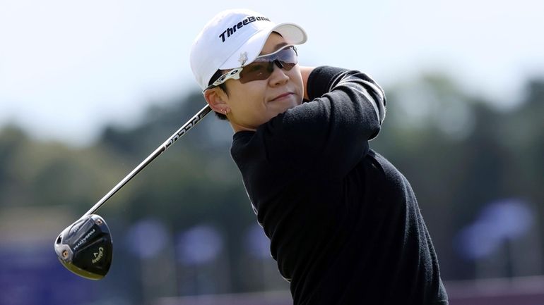 Korea's Jiyai Shin plays her shot at the 4th tee...