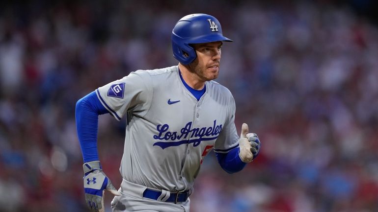 Los Angeles Dodgers' Freddie Freeman plays during a baseball game,...