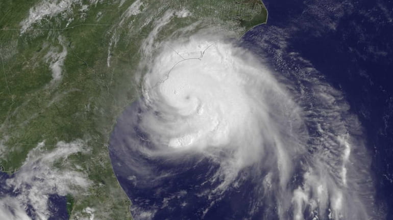 Hurricane Arthur moves up the East Coast on July 3,...