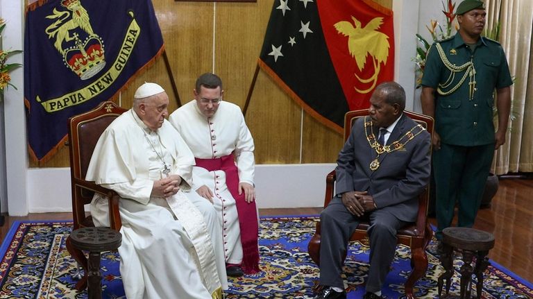 Pope Francis meets with the Papua New Guinea's Governor General...