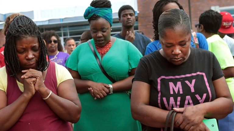 From left, Martha Hightower, Leah Clyburn and Marie Wilson attend...