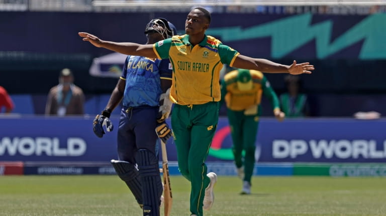 South Africa's Kagiso Rabada celebrates the dismissal of Sri Lanka's...