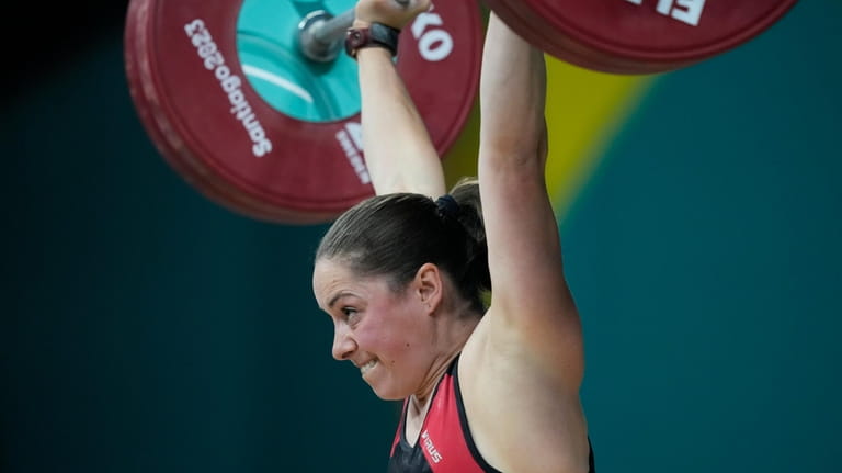 Canada's Maude Charron competes enroute ti winning the silver medal...