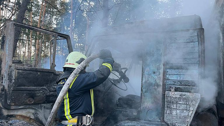 In this photo provided by the Ukrainian Emergency Service, rescuers...