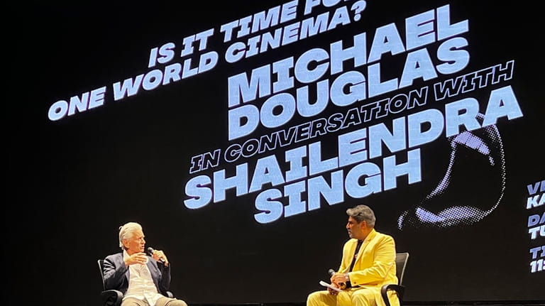 Hollywood actor and producer Michael Douglas speaks with Indian film...