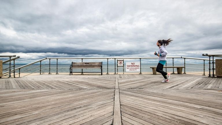 Marisa Reisinger, of Queens, goes for a run at Sunken...