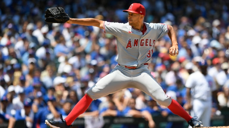 Los Angeles Angels starter Tyler Anderson delivers a pitch during...