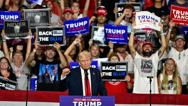 Republican presidential candidate former President Donald Trump speaks at a...