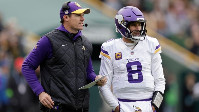 Minnesota Vikings head coach Kevin O'Connell and quarterback Kirk Cousins...