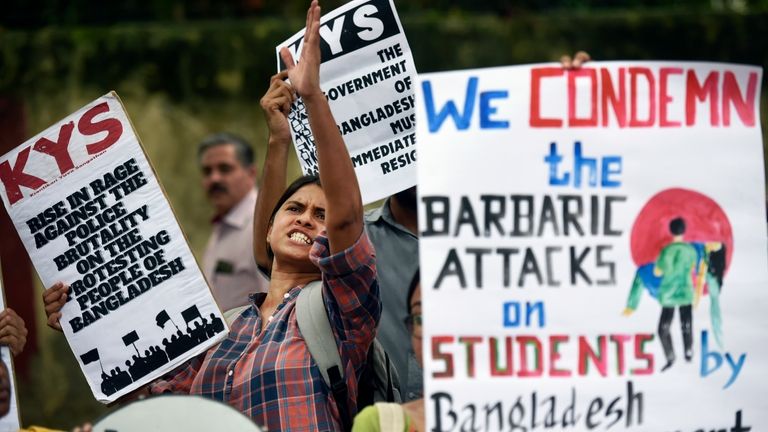 Activists of All India Democratic Students' Organisation (AIDSO) shout slogans...