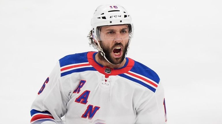 Rangers center Vincent Trocheck celebrates after scoring during the first...