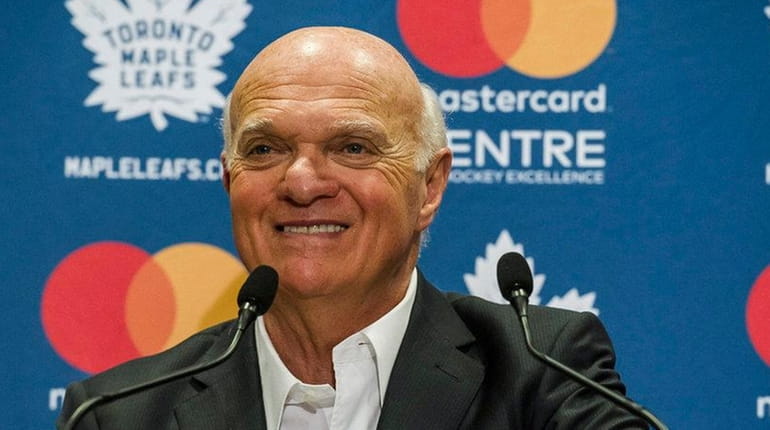 Lou Lamoriello speaks to reporters during a press conference on...
