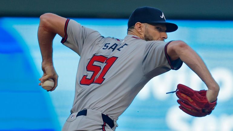 Atlanta Braves starting pitcher Chris Sale throws to the Minnesota...