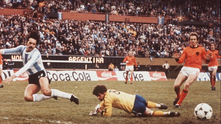 Argentinian Leopoldo Luque, left, flies through the air as Dutch...