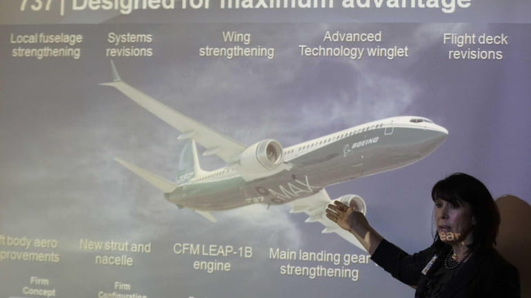 Boeing executive Beverly Wyse talks to reporters this past month...
