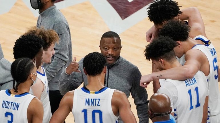 Kentucky assistant coach James "Bruiser" Flint speaks with the players...