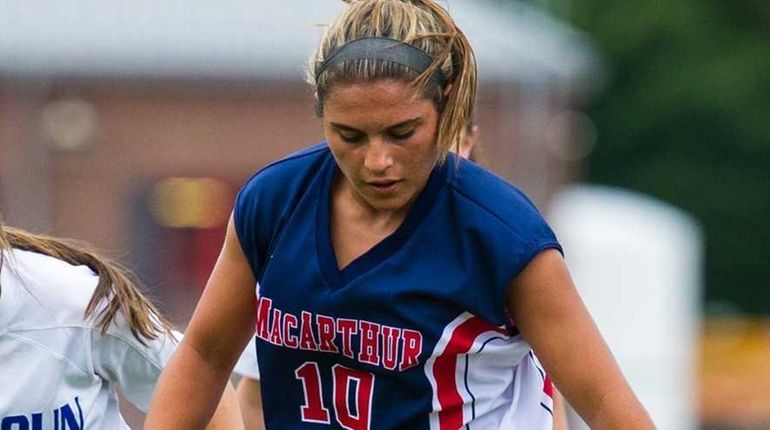 Calhoun midfielder Ariel Tillman attempts to steal possession away from...