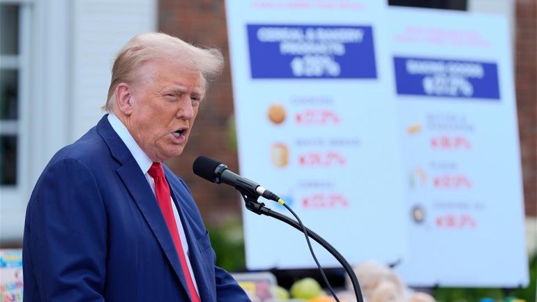 Republican presidential nominee former President Donald Trump speaks at a...