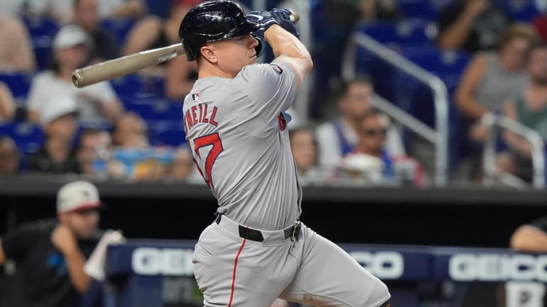 Boston Red Sox's Tyler O'Neill hits a double to center...