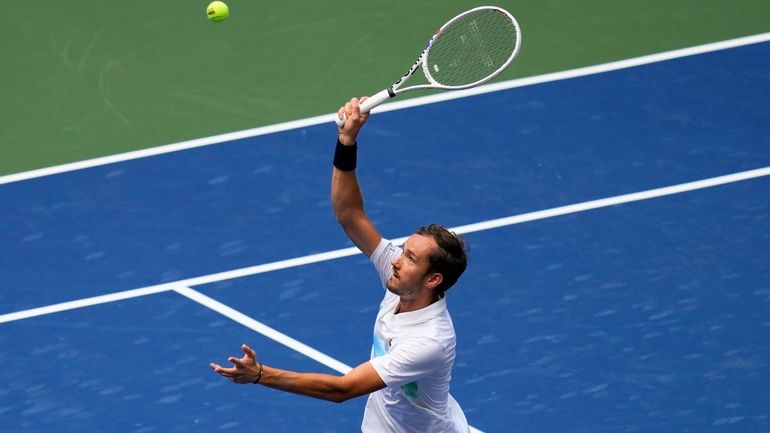 Daniil Medvedev, of Russia, serves during a match against Nuno...