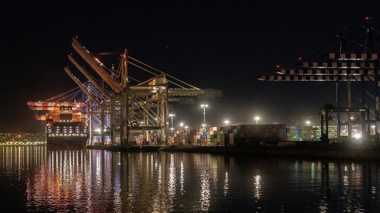 A ship is docked at the Port of Los Angeles...