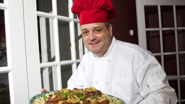 Frank Seabrook, aka Chef Franco, with his signature dish, pork...