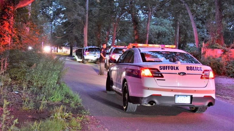 Suffolk police investigating a fatal stabbing on Woodland Avenue in Holtsville.