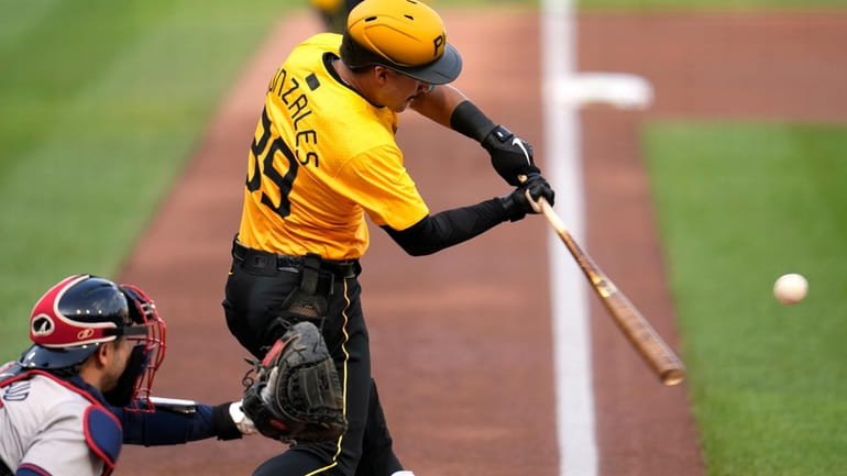 Pittsburgh Pirates' Nick Gonzales (39) hits a two-run single off...