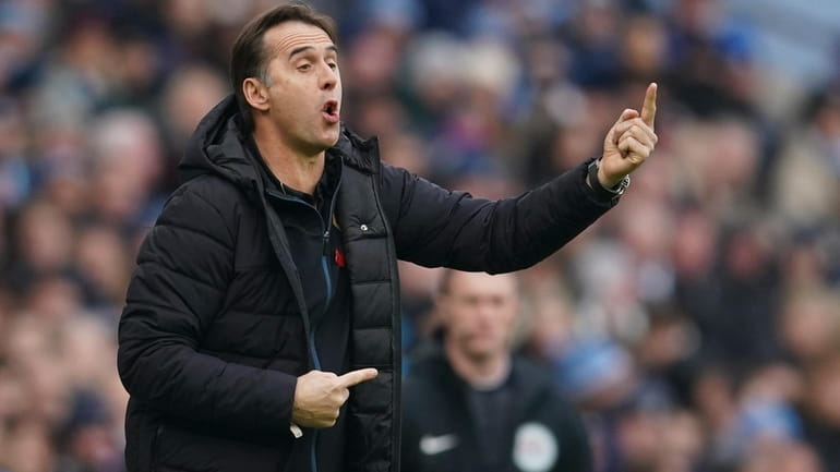Wolverhampton Wanderers' head coach Julen Lopetegui gestures during the English...