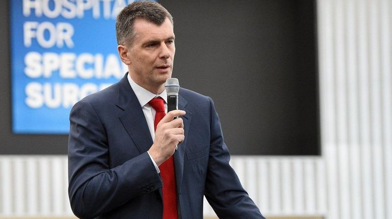 Brooklyn Nets owner Mikhail Prokhorov speaks during a press conference...