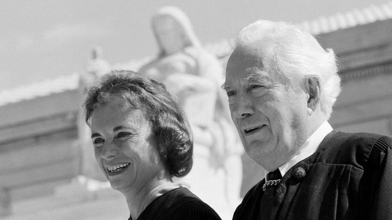 Sandra Day O'Connor and Chief Justice Warren Burger pose for...