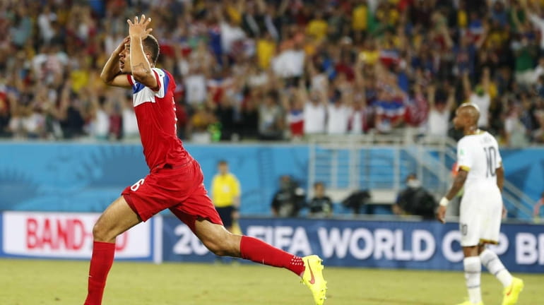 The United States' John Brooks reacts after scoring his side's...
