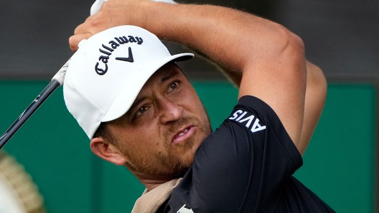 Xander Schauffele hits from the 15th tee during the first...