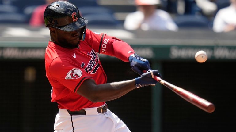 Cleveland Guardians' Jhonkensy Noel hits a single in the fifth...