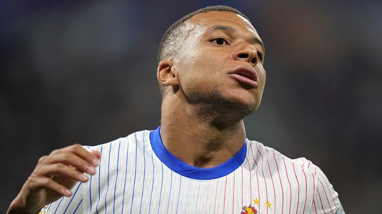 France's Kylian Mbappe reacts during the UEFA Nations League soccer...