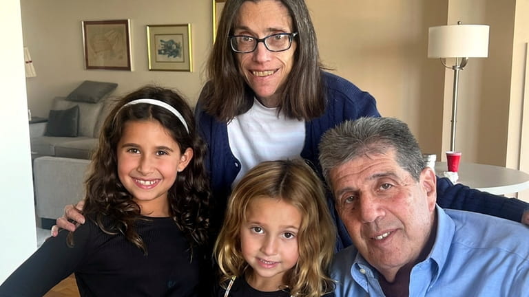Linda and Jeffrey Rosen with their grandchildren, Marlowe, left, and Chandler,...