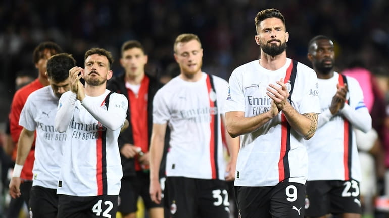 AC Milan's Olivier Giroud salutes the supporters following the Serie...