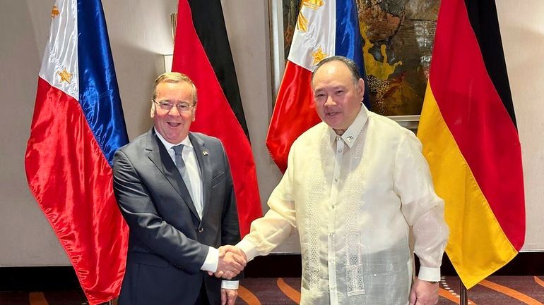 German Defense Minister Boris Pistorius, left, meets with his Philippine...